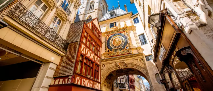Street view with the Gros Horloge astronomical clock in Rouen city, France