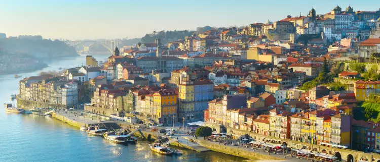 Aerial skyline shot of the colourful buildings in Porto Old Town in sunset light, Portugal.